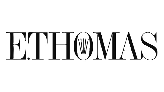 E.THOMAS